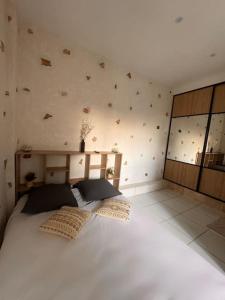 Appartements Appartement proche de Disney : photos des chambres