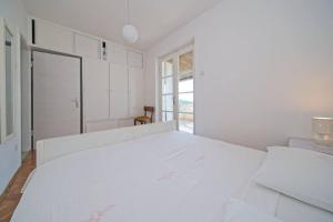 Apartments by the sea Postira, Brac - 22204