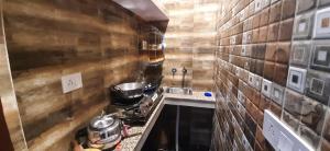 Aggarwal home stay in independent flat with private kitchen washroom fridge Android TV wi fi andcooking utensils for self cooking