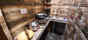 Aggarwal home stay in independent flat with private kitchen washroom fridge Android TV wi fi andcooking utensils for self cooking