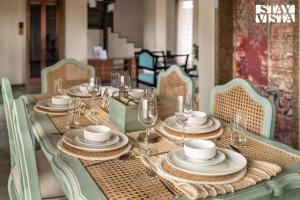 StayVistas Cerenity Castle - Lakeside Haven with Hill-View, Terrace & Indoor Entertainment