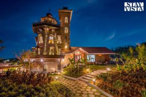 StayVistas Cerenity Castle - Lakeside Haven with Hill-View, Terrace & Indoor Entertainment