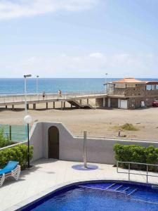 En la playa 2 dormitorios y piscina