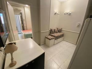 Уютная квартира в светлых тонах рядом с легендарной улицей Шератон в центре