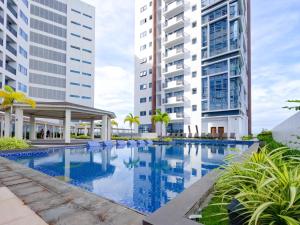 56sqm 2BR Condo at Mactan Newtown Pool and Beach Access!