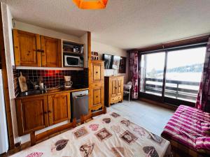 Appartements Studio cabine cosy aux Saisies, sud, 4 pers, skis aux pieds, proche ESF, tout equipe - FR-1-293-169 : photos des chambres