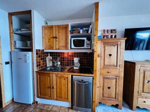 Appartements Studio cabine cosy aux Saisies, sud, 4 pers, skis aux pieds, proche ESF, tout equipe - FR-1-293-169 : photos des chambres