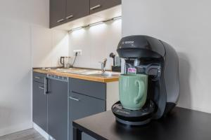 MINT Design-Studio mit Balkon