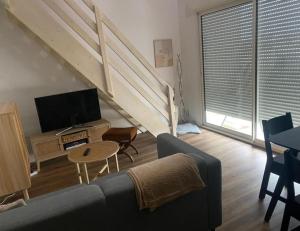 Appartements Appartement mezzanine + terrasse, cosy et lumineux : photos des chambres