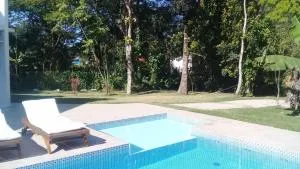 Linda casa de temporada com ar condicionado - Прая-Ґуаратуба