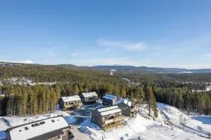 Parkstigens Fjällby - Kåvan - Baggården