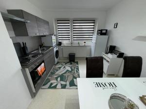 FeWo Elbo46 mit Balkon, Waschmaschine & Smart TV