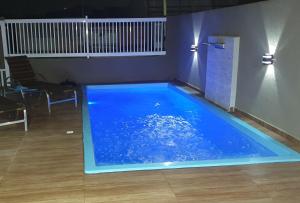 Mar Doce Lar Casa na praia de guaratuba com piscina e ar condicionado