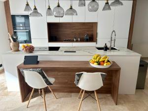 Villas Villa Einigriv : photos des chambres