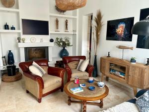 Villas Villa Einigriv : photos des chambres