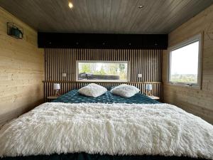 Chalets La Cabane D-Emma Spa&Sauna prive : photos des chambres