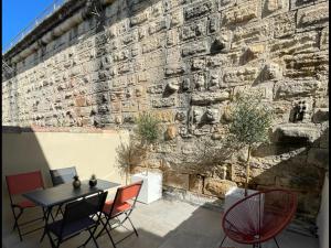 Maisons de vacances Maison cosy, 2 chambres, adossee aux remparts : photos des chambres