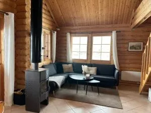 Koslig tømmerhytte - 基尔匹斯扎我维