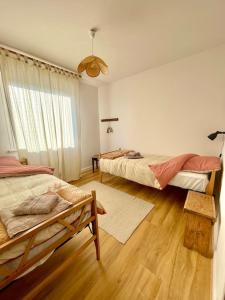 Maison individuelle 100 m2, jardin et parking privé