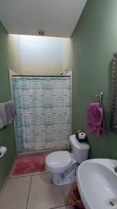 House 5 min by the beach, with wide open garage.