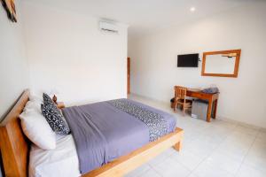 Kayuma Catu Canggu