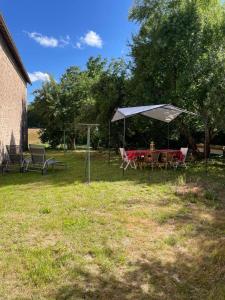 Appartements La Maison du bonheur - Gite RULINA - Corancy : photos des chambres