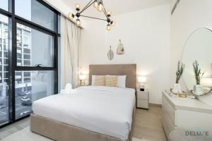 Comfy 1BR in Azizi Riviera 8, Al Merkadh by Deluxe Holiday Homes