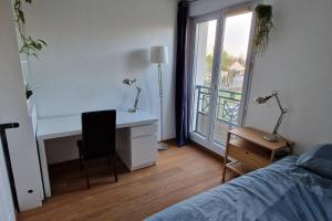 Maisons de vacances Maison cosy-JO24 a Voisins-le-Bx : photos des chambres