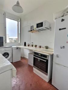 Boulogne 2 pièces de charme au dernier étage sur jardin.