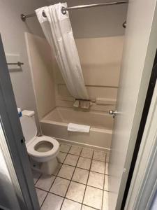 Queen Room with Two Queen Beds - Non-Smoking room in Days Inn & Suites by Wyndham Monroe