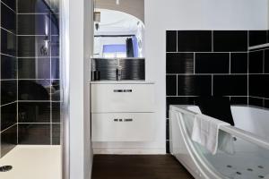 Appartements NG SuiteHome - Lille l Roubaix Trichon - Balneo - Netflix - Wifi : photos des chambres