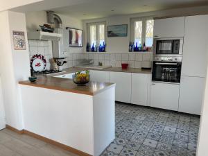 Maisons de vacances La Falaise Bleue - Vue mer - Plage a pied : photos des chambres