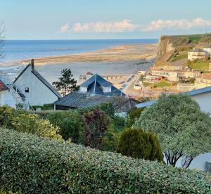 Maisons de vacances La Falaise Bleue - Vue mer - Plage a pied : photos des chambres