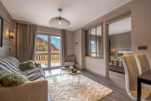 Superbe Appartement au Plateau Rond-Point des Pistes Classé 3 Etoiles et Label Méribel