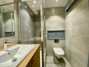 Superbe Appartement au Plateau Rond-Point des Pistes Classé 3 Etoiles et Label Méribel