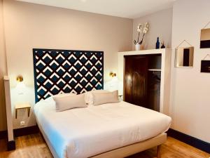 Appart'hotels Les Suites de l'Enclos - L'Enclos de l'Eveche : photos des chambres