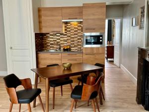 Appart'hotels Les Suites de l'Enclos - L'Enclos de l'Eveche : photos des chambres