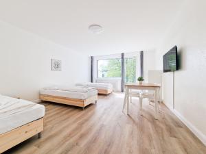 Tolstov Apartments - Monteurwohnungen - 3 Schlafzimmer - Küche - Balkon - Waschmaschine - 25 Min zur Messe DUS