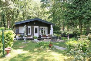 Vakantie Bos Huisje “Meibloempje”