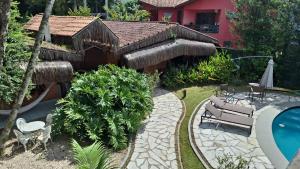 Pousada North Shore Maresias - 2 quadras da praia - Casas de 2 quartos - 80 m2 -2 banheiros -piscina sauna - estacion-churrasq privativa -wifi animais de peq porte roupa de cama e banho