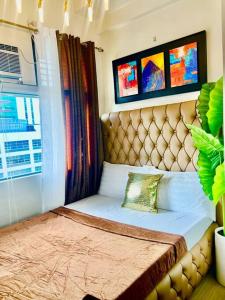 300 Mbps WiFi - 55 inch SMART TV - Alabang condo near Bellevue Hotel Filinvest City