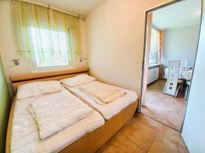 SANDRO Haus KMB Seeappartement am Ossiacher See mit direktem Seezugang und Hallenbad