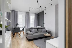 Black and Grey Apartment in Cracow with Balcony, Parking and Desk by Renters