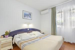 Appartements Le Mas Berliat F2 N°15 : photos des chambres