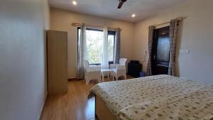 Horizon Hues1bhk overlooking the hills with Wifi