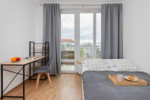 Apartment in Gdańsk Center with Two Desks, Balcony and Separate Kitchen by Renters