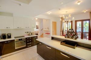 Luxury Elite Villa AJ05 complete with a private, climate controlled pool and a relaxing outdoor Jacuzzi, Aphrodite Hills Resort