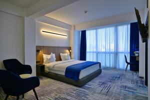 Deluxe Junior Suite room in Expocenter Hotel