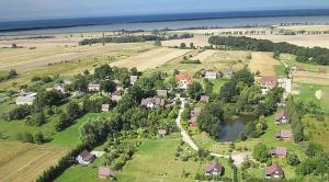 Ferienhäuser in den Magra-Gärten - an der polnischer Ostseeküste - Ferienhaus Grün