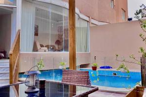 Elegant Apartment - Private Pool & Garden Views